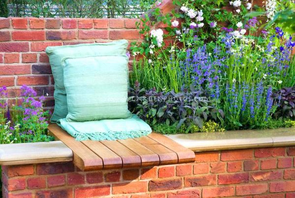 14 Brick Flower Bed Design Ideas You Can Replicate Instantly   Brick Flower Bed With Seat 600x402 