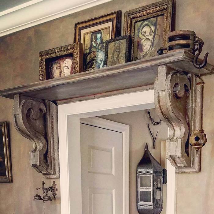 Old World Elegance with Distressed Over-Door Display #corbel #decoration #decorhomeideas