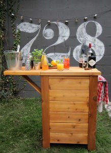 An Outdoor Bar Idea Made From Wood 218x300 