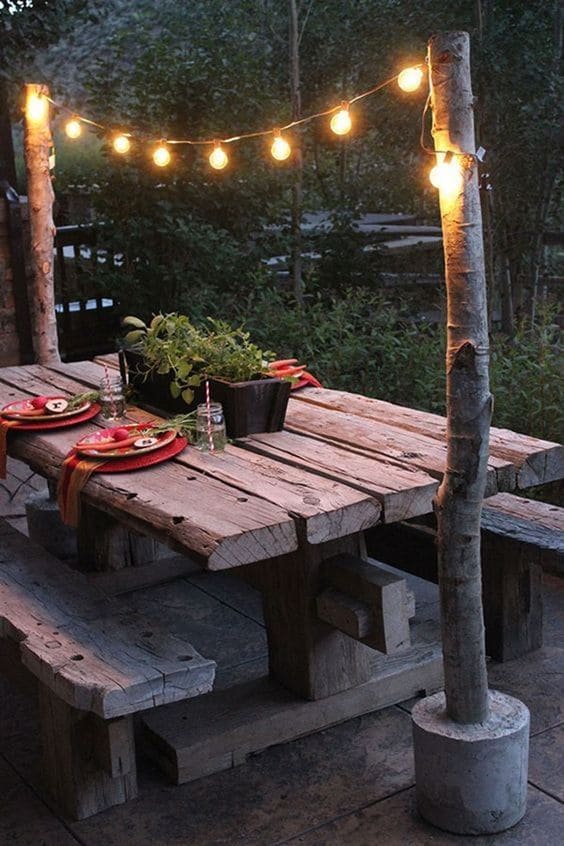 Cottage Backyard with Log Table and Benches #backyard #outdoorspaces #decorhomeideas