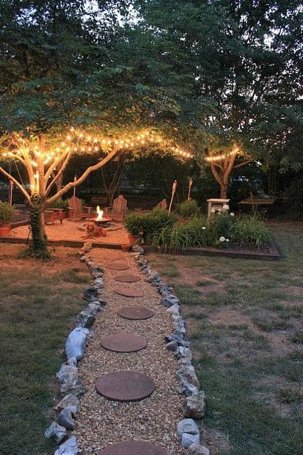 Cottage Backyard with Stone Garden Path and String Lights #backyard #outdoorspaces #decorhomeideas