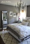 Charming Patterns And Fresh White Accents Adorn A Solid Grey Base Bedroom 102x150 