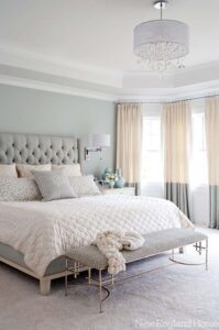 Luxe Feminine Decor And Furniture Heighten This Soft Grey Bedroom 199x300 