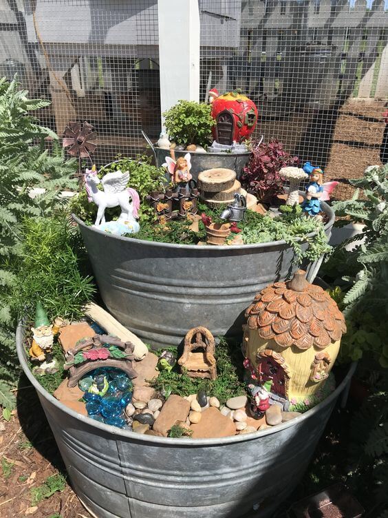 A Tiered Fairy Garden Using Galvanized Tubs