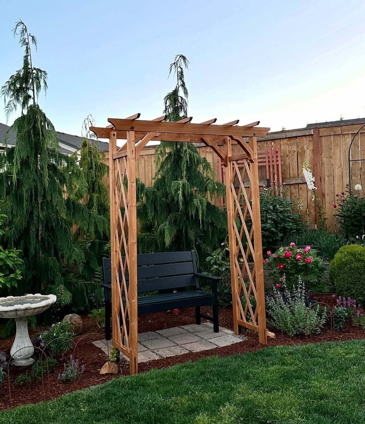 corner garden ideas for a cozy backyard 1