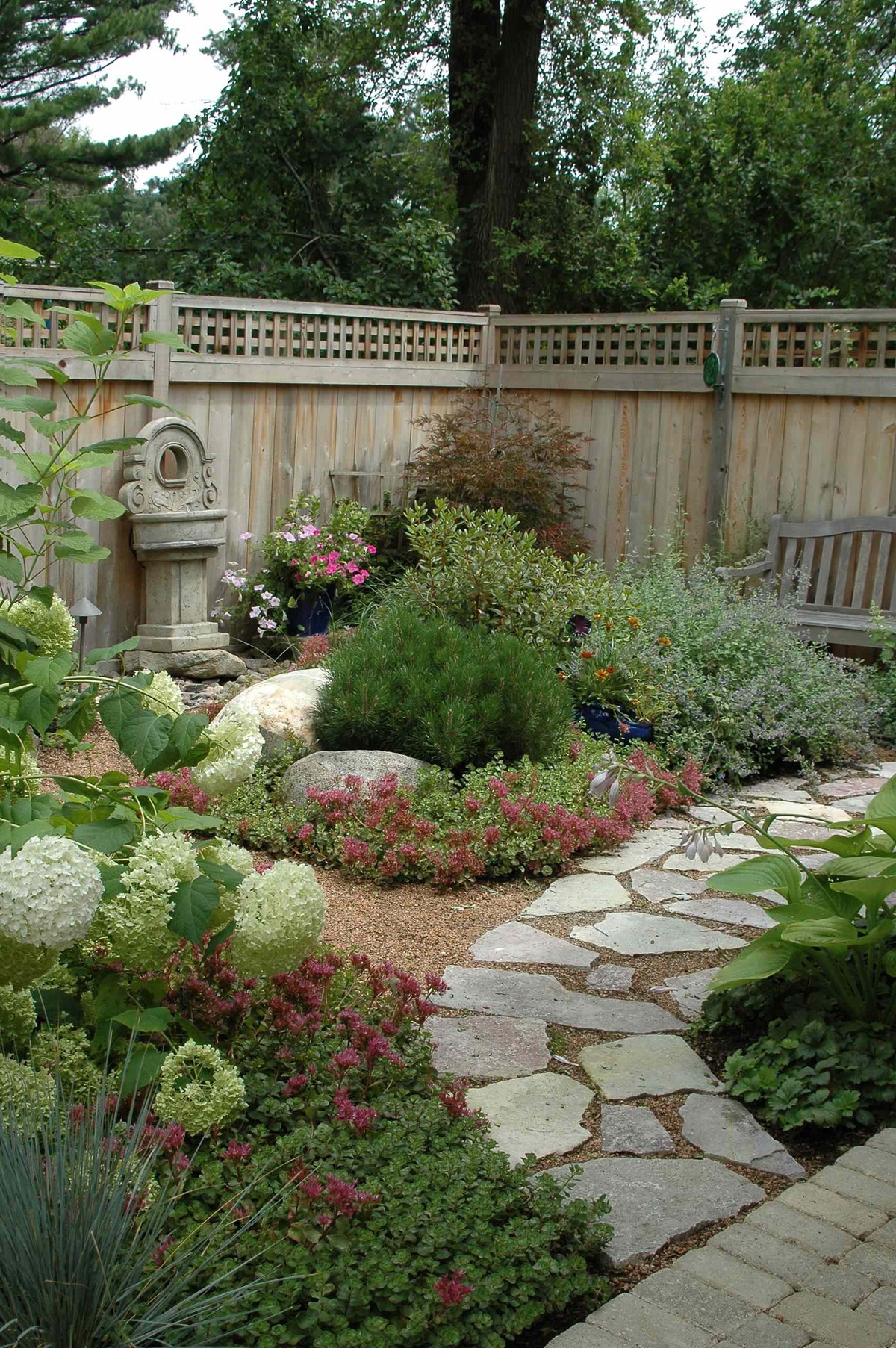 corner garden ideas for a cozy backyard 15