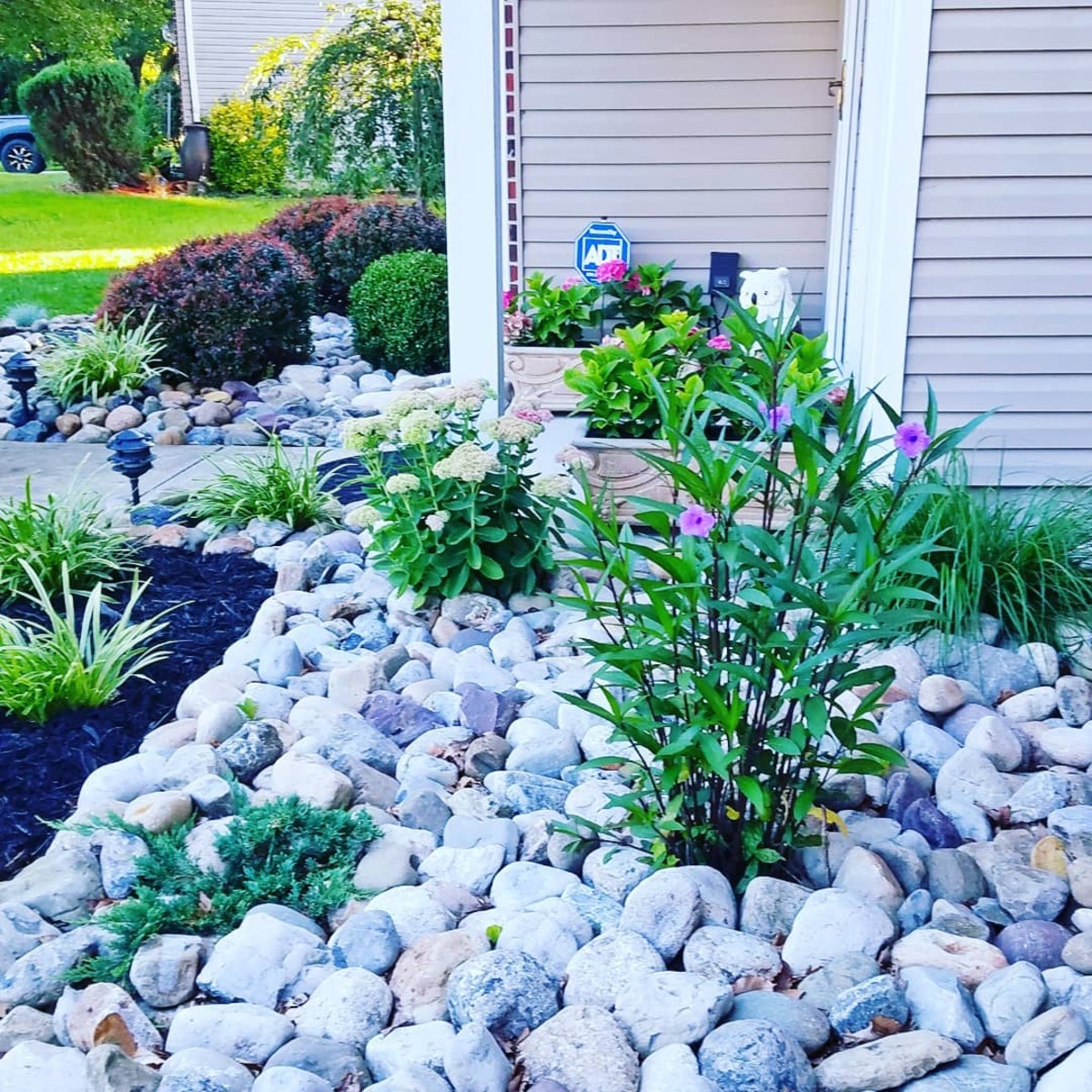 flower bed ideas using rocks instead of mulch 7